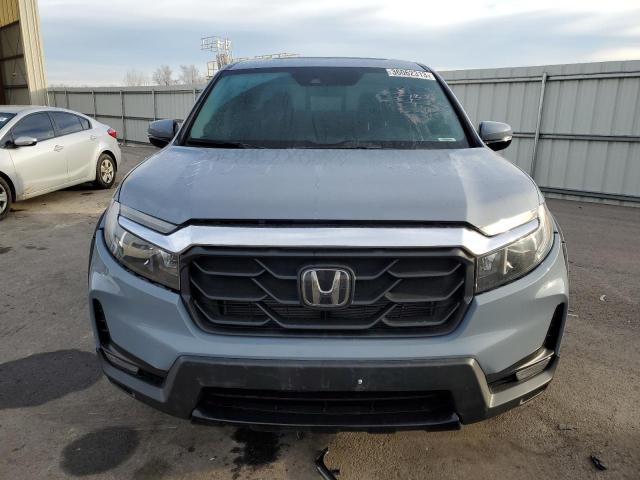 Photo 5 from auction – 2022 HONDA RIDGELINE with VIN 5FPYK3F71NB022074
