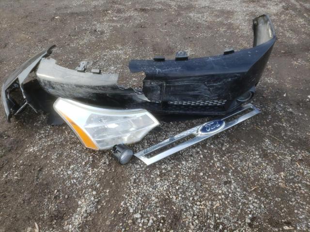 Photo 12 from auction – 2011 FORD FOCUS SE with VIN 1FAHP3FN9BW156529