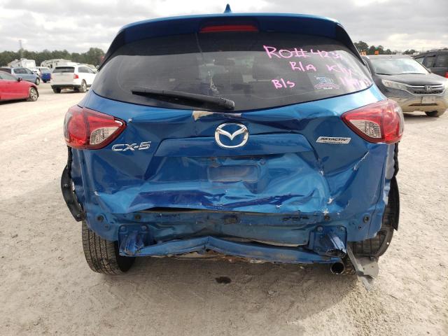 Photo 6 from auction – 2014 MAZDA CX-5 SPORT with VIN JM3KE2BE4E0339423
