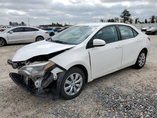 TOYOTA COROLLA L 2014 with VIN 5YFBURHE1EP057063 - Photo from auction