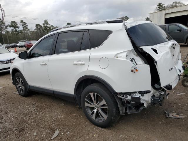 Photo 2 from auction – 2017 TOYOTA RAV4 XLE with VIN JTMWFREV3HD097779