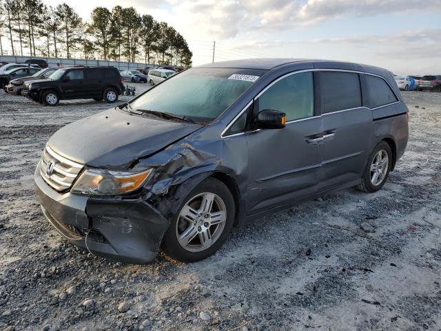 HONDA ODYSSEY TO 2012 with VIN 5FNRL5H97CB096844 - Photo from auction