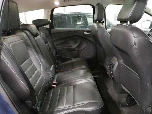 Photo 11 from auction – 2018 FORD ESCAPE TIT with VIN 1FMCU9J99JUC58736