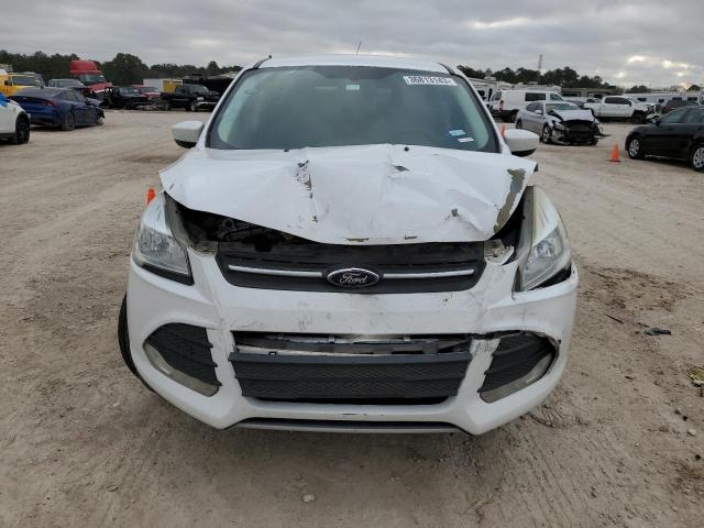 Photo 5 from auction – 2016 FORD ESCAPE SE with VIN 1FMCU9GX9GUC64762