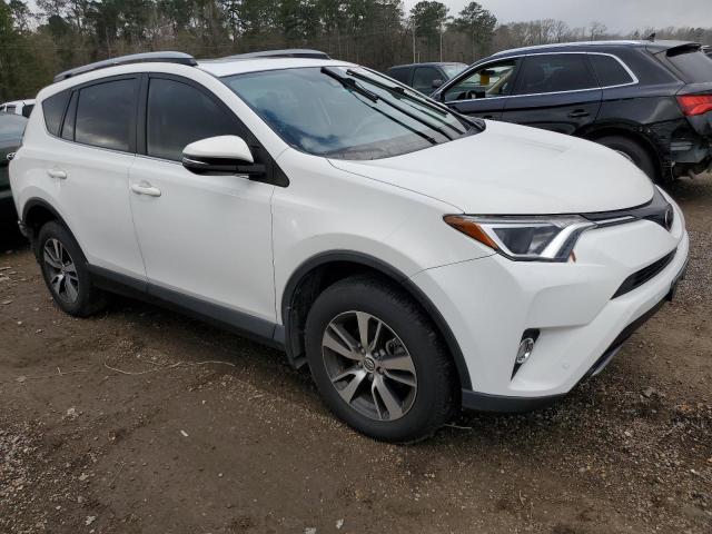 Photo 4 from auction – 2017 TOYOTA RAV4 XLE with VIN JTMWFREV3HD097779