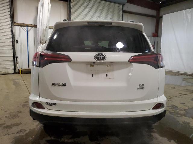 Photo 6 from auction – 2018 TOYOTA RAV4 LE with VIN JTMBFREV0JJ244663