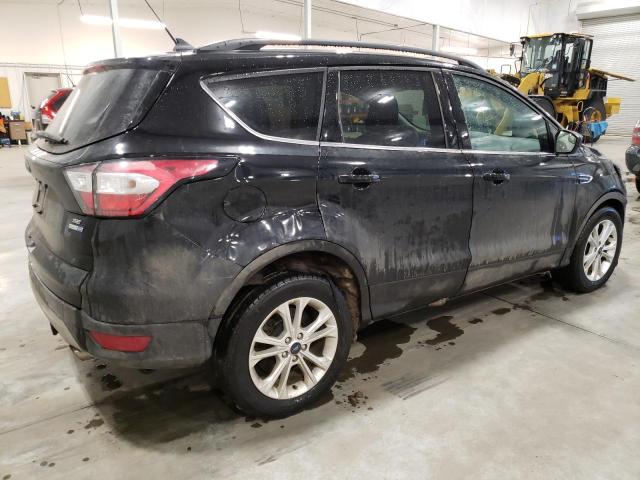Photo 3 from auction – 2018 FORD ESCAPE SE with VIN 1FMCU9GD5JUD59669