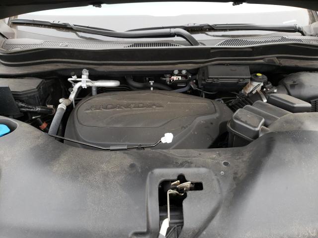 Photo 12 from auction – 2021 HONDA PASSPORT E with VIN 5FNYF8H55MB032725