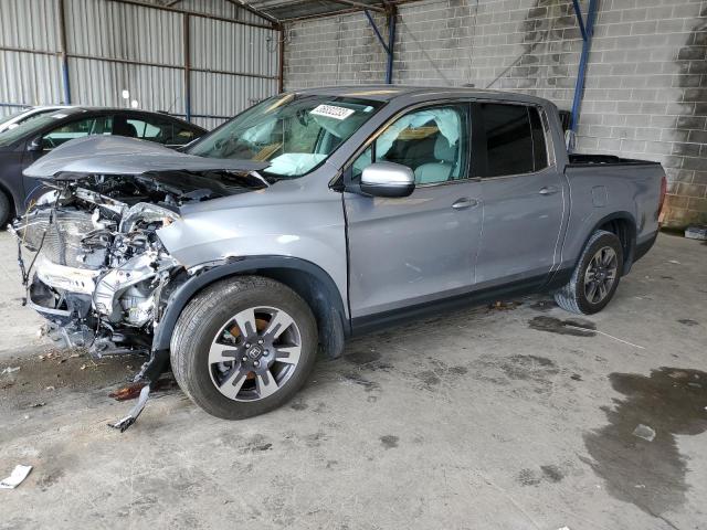 HONDA RIDGELINE 2018 with VIN 5FPYK2F63JB000301 - Photo from auction