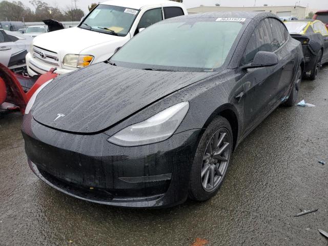 TESLA MODEL 3 2021 with VIN 5YJ3E1EA9MF977005 - Photo from auction