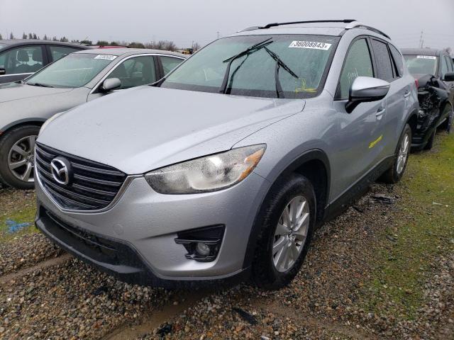 MAZDA CX-5 SPORT 2016 with VIN JM3KE2BE3G0686888 - Photo from auction