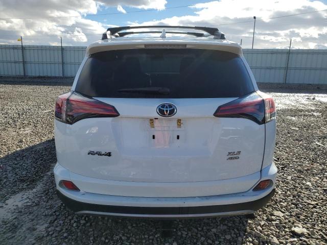 Photo 6 from auction – 2017 TOYOTA RAV4 XLE with VIN 2T3RFREV3HW610691