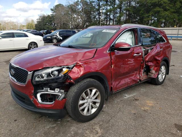 KIA SORENTO LX 2018 with VIN 5XYPG4A32JG357024 - Photo from auction