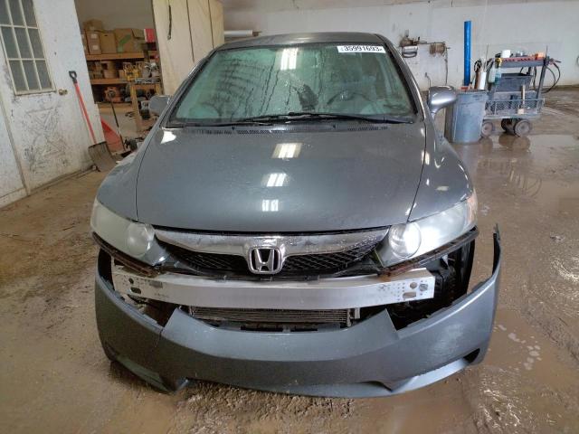 Photo 5 from auction – 2011 HONDA CIVIC LX with VIN 19XFA1F54BE023274