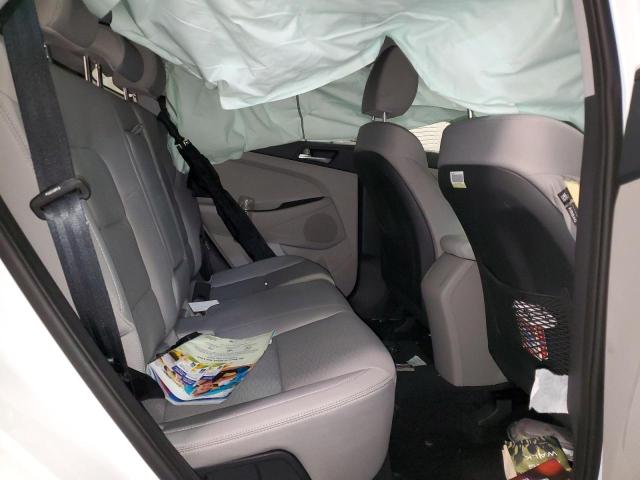 Photo 11 from auction – 2019 HYUNDAI TUCSON SE with VIN KM8J2CA46KU073124