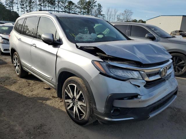 Photo 4 from auction – 2022 HONDA PILOT TOUR with VIN 5FNYF5H92NB005954