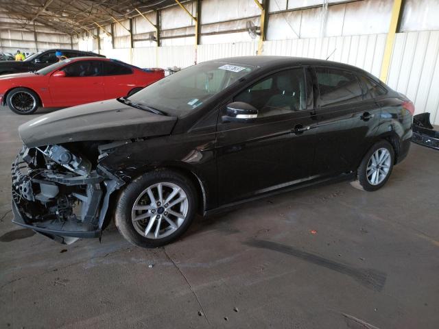 FORD FOCUS SE 2017 with VIN 1FADP3F2XHL284969 - Photo from auction