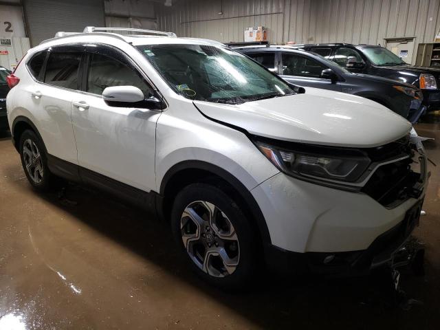 Photo 4 from auction – 2017 HONDA CR-V EX with VIN 5J6RW2H55HL009136