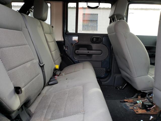 Photo 11 from auction – 2008 JEEP WRANGLER U with VIN 1J8GA59148L620468