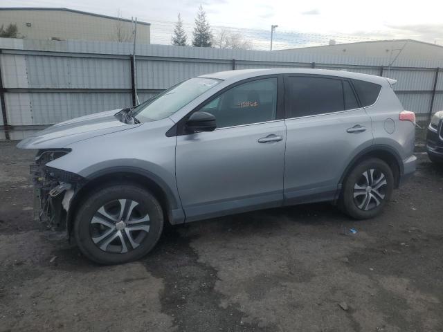 TOYOTA RAV4 LE 2018 with VIN 2T3BFREV0JW716264 - Photo from auction