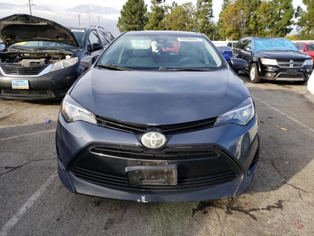 Photo 5 from auction – 2017 TOYOTA COROLLA L with VIN 5YFBURHE1HP571337