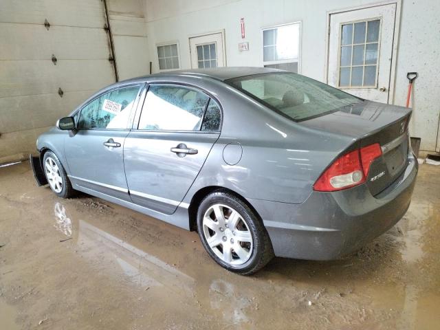 Photo 2 from auction – 2011 HONDA CIVIC LX with VIN 19XFA1F54BE023274