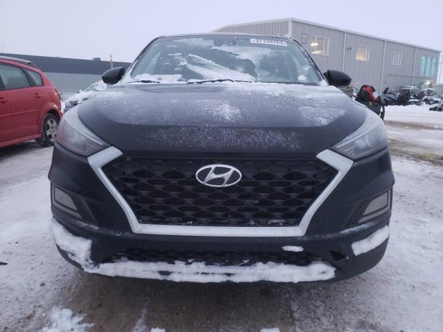 Photo 5 from auction – 2019 HYUNDAI TUCSON SE with VIN KM8J2CA44KU870844