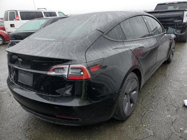 Photo 3 from auction – 2021 TESLA MODEL 3 with VIN 5YJ3E1EA9MF977005