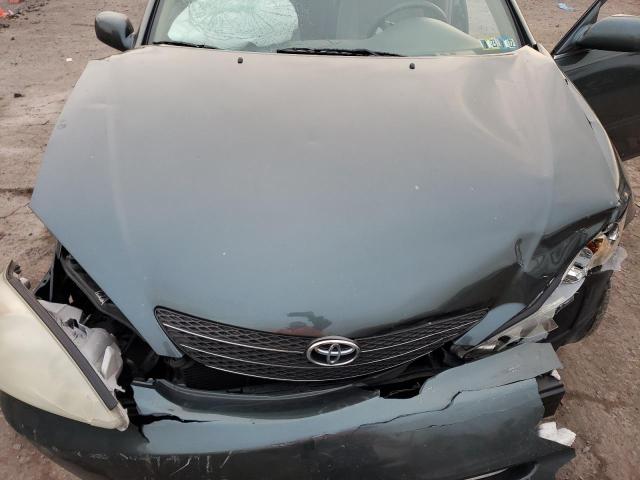 Photo 11 from auction – 2003 TOYOTA CAMRY LE with VIN 4T1BE32K03U666164