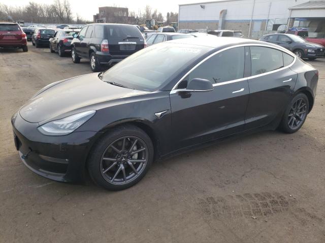 TESLA MODEL 3 2018 with VIN 5YJ3E1EB3JF118934 - Photo from auction