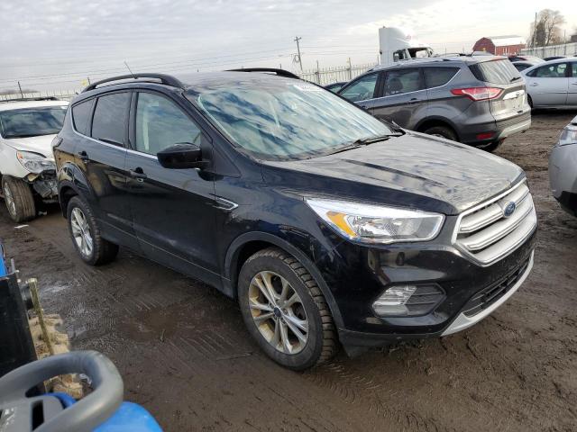 Photo 4 from auction – 2018 FORD ESCAPE SE with VIN 1FMCU9GD0JUD19564