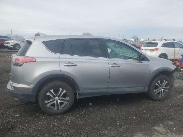 Photo 3 from auction – 2018 TOYOTA RAV4 LE with VIN 2T3BFREV0JW716264