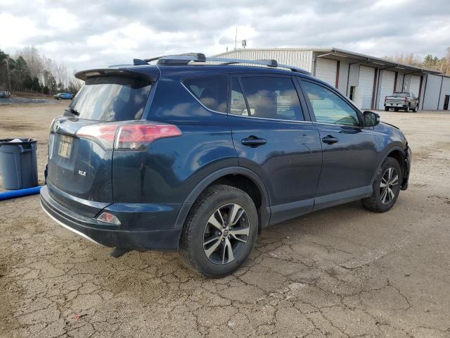 Photo 3 from auction – 2017 TOYOTA RAV4 XLE with VIN JTMWFREV1HJ115407