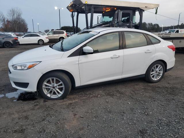 FORD FOCUS SE 2018 with VIN 1FADP3F23JL209858 - Photo from auction