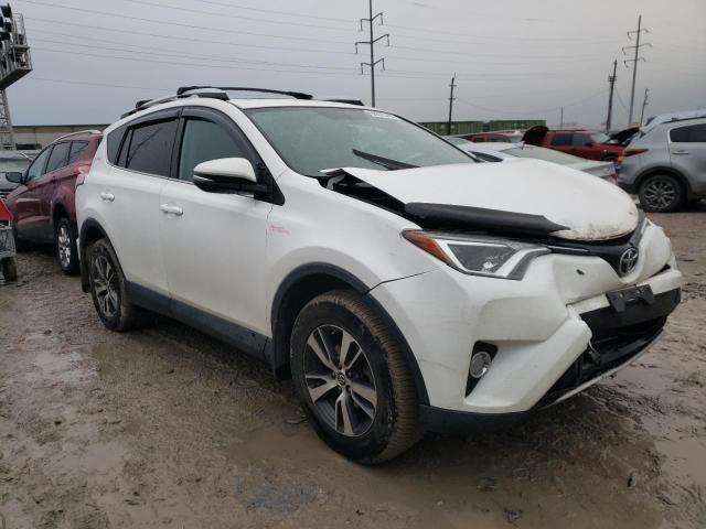 Photo 4 from auction – 2016 TOYOTA RAV4 XLE with VIN 2T3RFREV2GW535089
