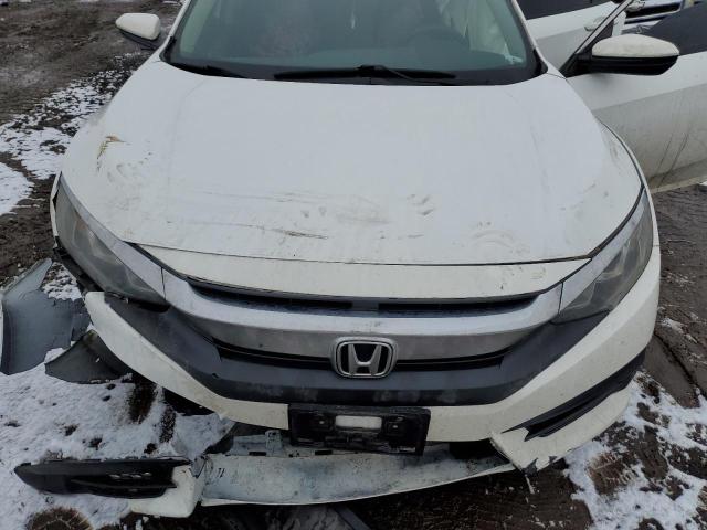 Photo 11 from auction – 2016 HONDA CIVIC LX with VIN 2HGFC2F54GH564662