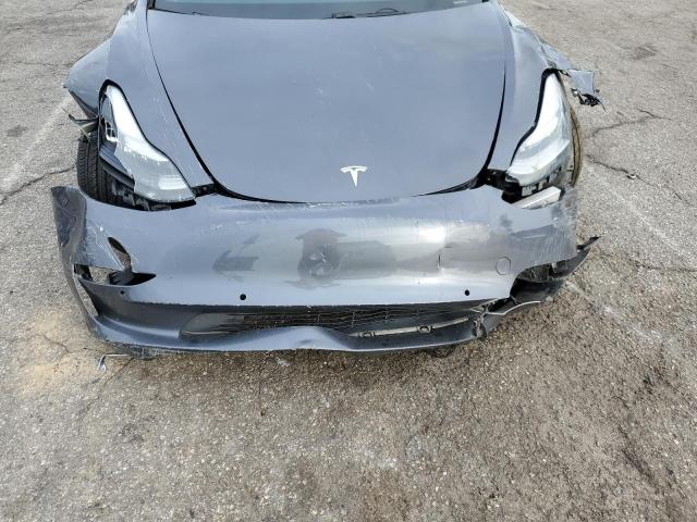 Photo 11 from auction – 2018 TESLA MODEL 3 with VIN 5YJ3E1EA8JF013376
