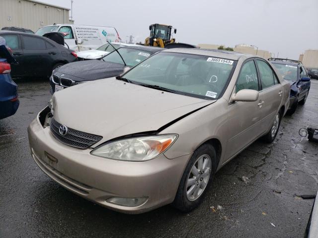 TOYOTA CAMRY LE 2003 with VIN 4T1BE30K93U217679 - Photo from auction