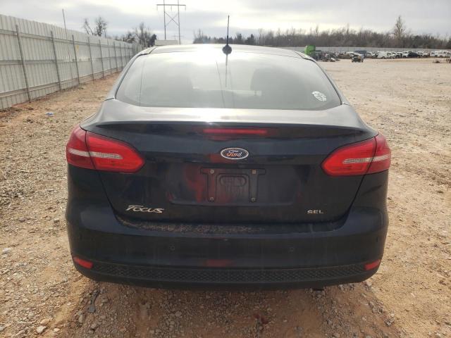 Foto 6 de la subasta – 2017 FORD FOCUS SEL con VIN 1FADP3H22HL237206