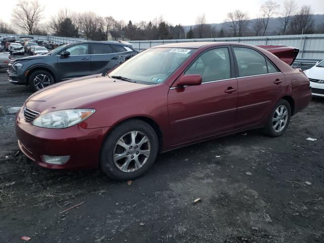 TOYOTA CAMRY LE 2005 with VIN 4T1BF30K45U098150 - Photo from auction