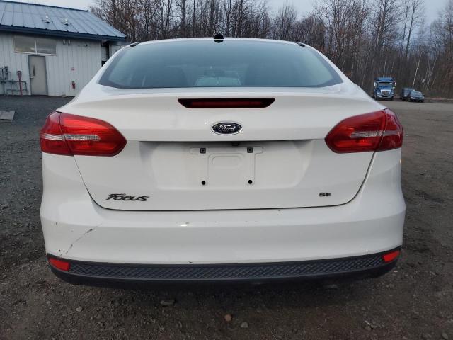 Photo 6 from auction – 2018 FORD FOCUS SE with VIN 1FADP3F23JL209858