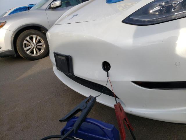 Photo 13 from auction – 2021 TESLA MODEL Y with VIN 5YJYGDEF2MF182763