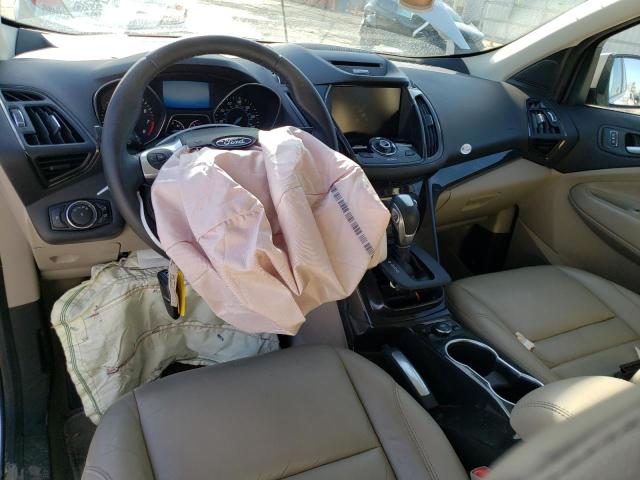 Photo 8 from auction – 2015 FORD ESCAPE TIT with VIN 1FMCU0J98FUA03479