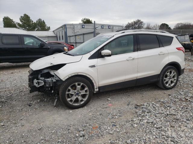 FORD ESCAPE TIT 2016 with VIN 1FMCU0JX4GUB15180 - Photo from auction