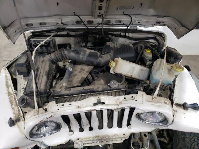 Photo 11 from auction – 1999 JEEP WRANGLER / with VIN 1J4FY29P3XP421818