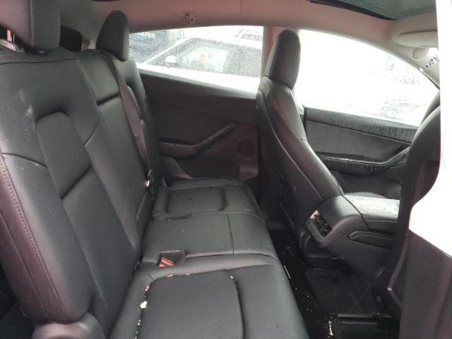 Photo 11 from auction – 2022 TESLA MODEL Y with VIN 7SAYGAEE5NF352771