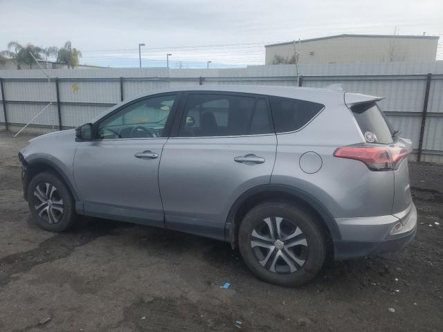 Photo 2 from auction – 2018 TOYOTA RAV4 LE with VIN 2T3BFREV0JW716264