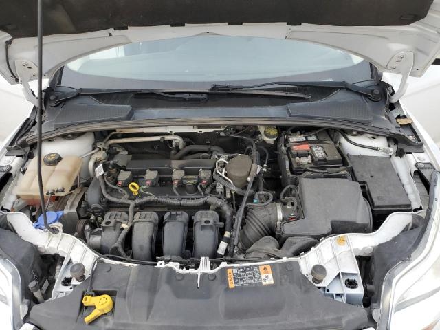 Photo 11 from auction – 2014 FORD FOCUS SE with VIN 1FADP3F22EL316731