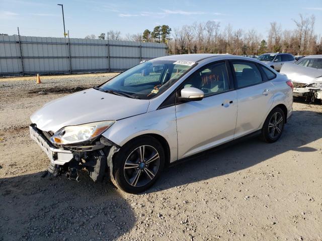 FORD FOCUS SE 2014 with VIN 1FADP3F20EL172614 - Photo from auction