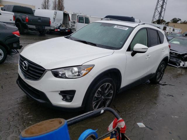 MAZDA CX-5 GT 2016 with VIN JM3KE4DY1G0800745 - Photo from auction